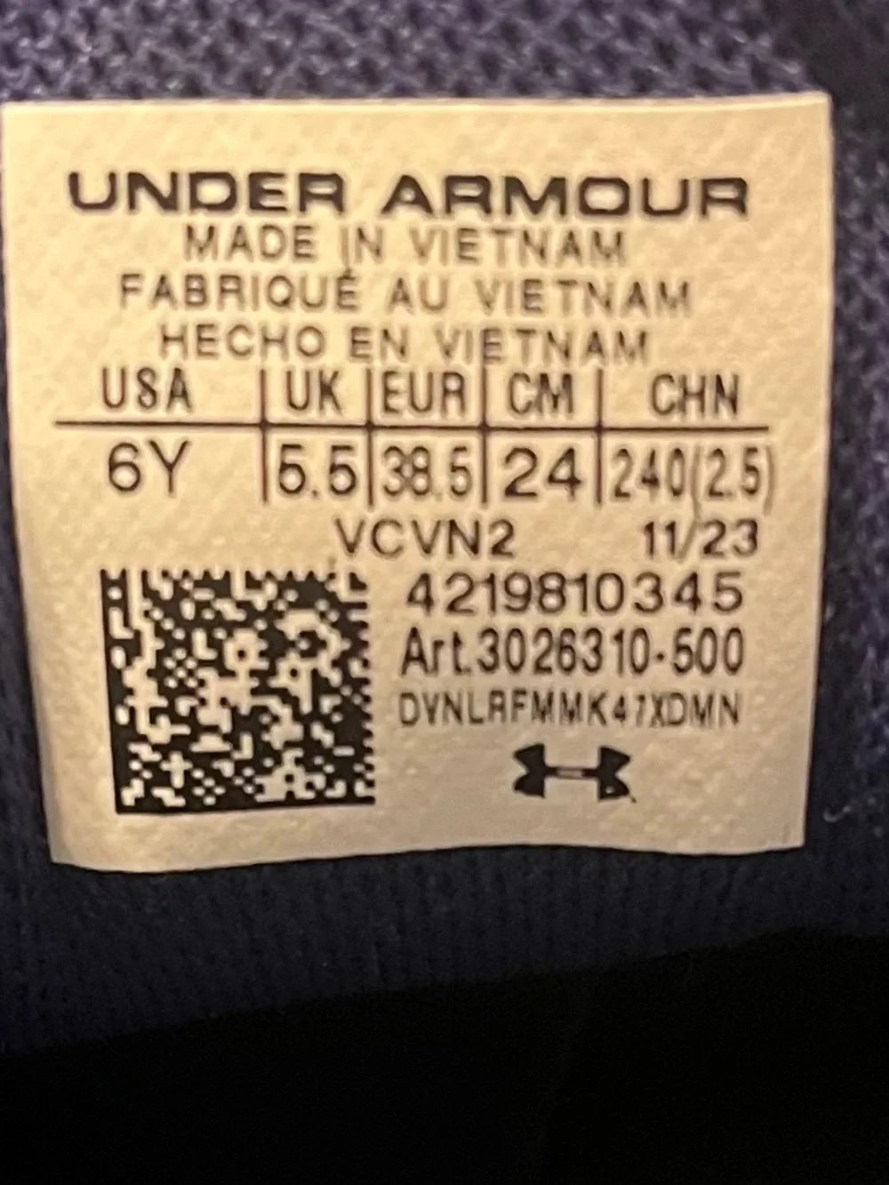 Under Armour Charged Rogue running shoes. Purple and teal. 6y or 7.5-8 women.